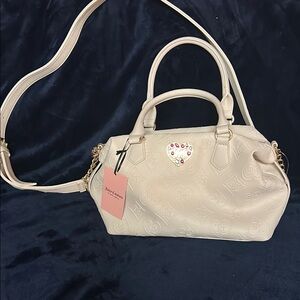 Juicy Couture handbag w/adjustable shoulder strap and handles
